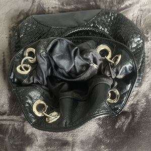 Black large boho vintages satchel.